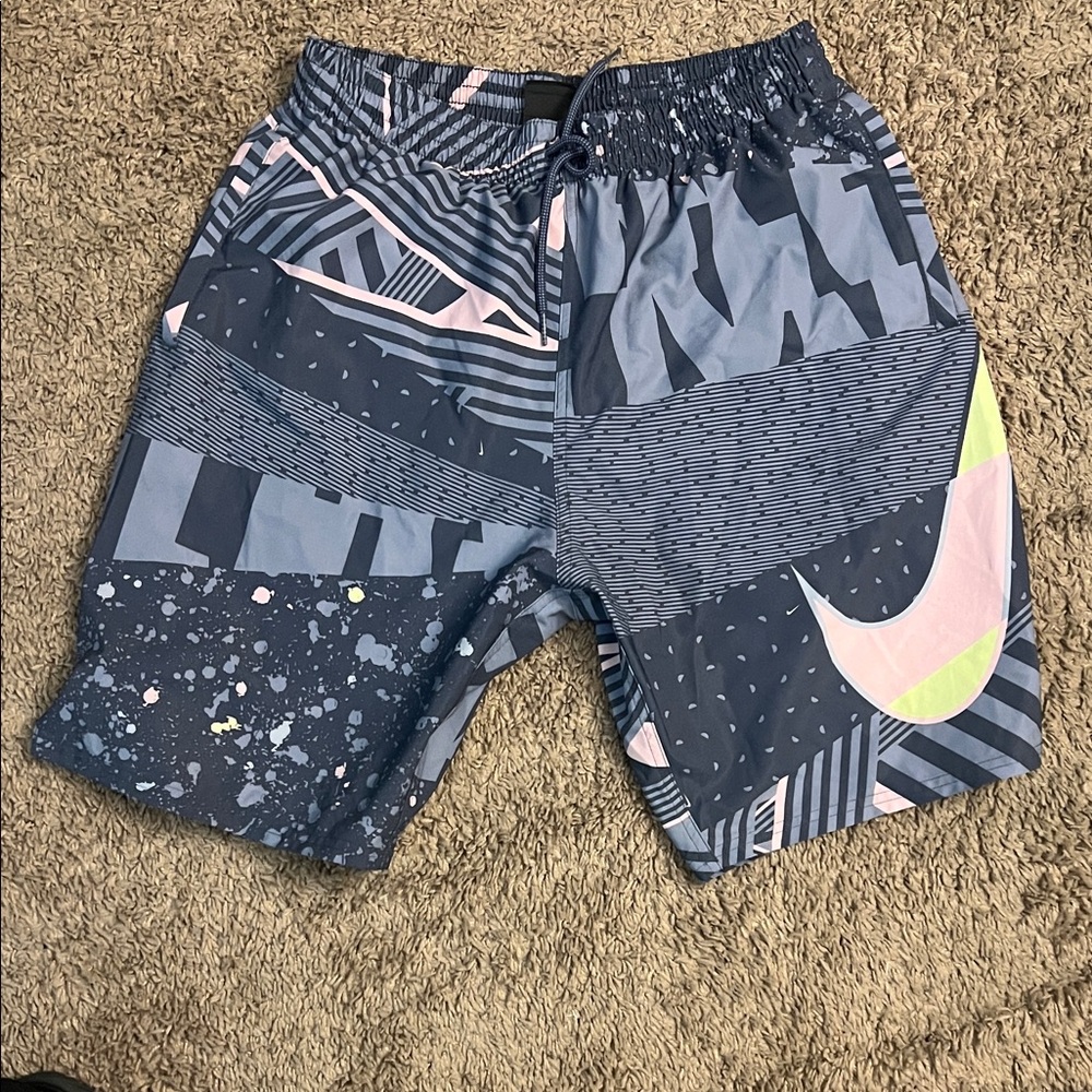 Nike Men's Athletic Swim Shorts with mesh liner in Blue and Pink.